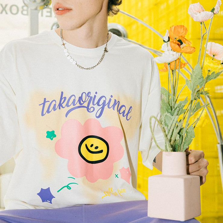 Lil Daisy Smile Flower T-Shirt from Taka Original | Shop online at good-times.ae | Online Streetwear and Skate Shop in Dubai